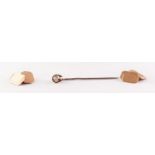 A PAIR OF 9ct GOLD CUFFLINKS, also an early TWENTIETH CENTURY 15ct gold STICK PIN, set with a