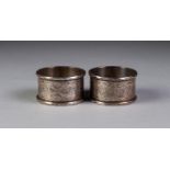 EDWARD VII, PAIR OF SILVER NAPKIN RINGS, scroll engraved, initialled, Birmingham 1907, 2oz, (2)