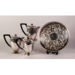PAIR OF ASHBERRY ELECTROPLATED PEDESTAL HOT WATER JUGS, each with black angular scroll handle and
