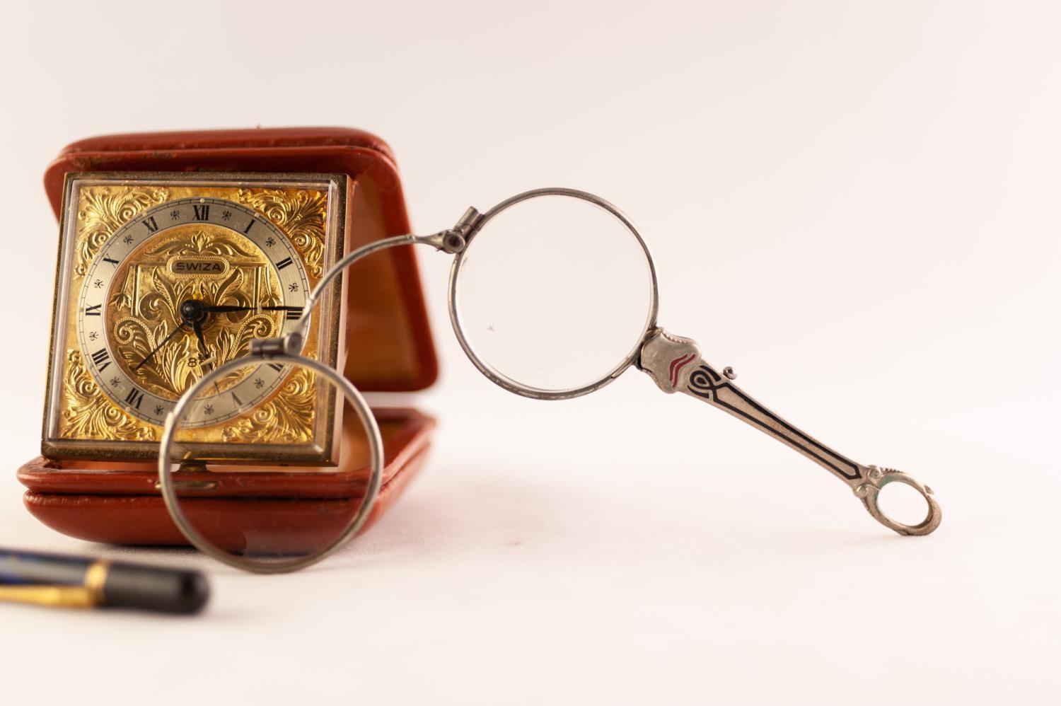 ENAMELLED WHITE METAL LORGNETTE; a Swiza Swiss-made TRAVEL ALARM CLOCK in tan hide golding case - Image 2 of 3