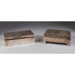TWO OBLONG SILVER CLAD TABLE CIGARETTE BOXES WITH ENGINE TURNED COVERS and hardwood lined