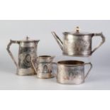 ELKINGTON & Co FOUR PIECE ENGRAVED ELECTROPLATED TEASET, of oval form with angular scroll handles,