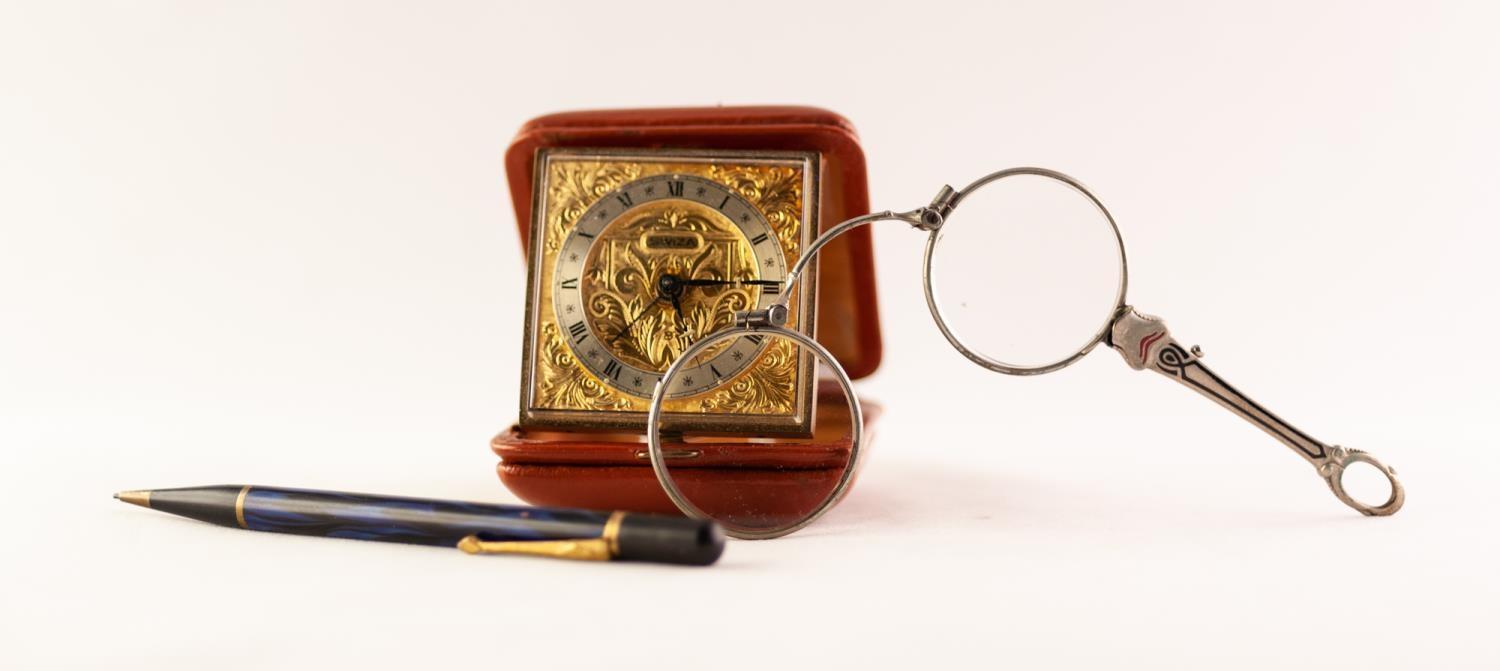 ENAMELLED WHITE METAL LORGNETTE; a Swiza Swiss-made TRAVEL ALARM CLOCK in tan hide golding case