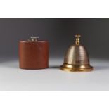 A LATE VICTORIAN/EDWARDIAN BRASS HONEY-SKEP FORM COUNTER BELL, and a leather and white metal