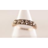 9ct GOLD RING with a row of five rose cut diamonds and four tiny diamonds at each end 1.9 gms,