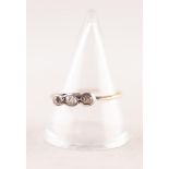 GOLD COLOURED METAL RING COLLET SET WITH SMALL OLD CUT OVAL DIAMONDS, approximately 1/3ct in