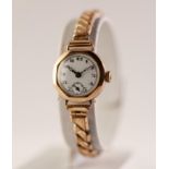 LADY'S VERTEX V.W.C. SWISS 9ct GOLD VINTAGE WRISTWATCH with 15 jewels movement, arabic round dial