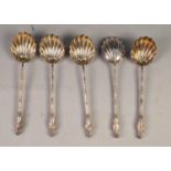 A SET OF FIVE CHINESE SILVER COLOURED METAL SCALLOP BOWL TEASPOONS, the simulated bamboo handles
