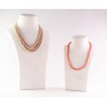 .925 SILVER CLASPED NECKLACE, formed of approx 90 tiny coral beads, and a SIMULATED TRIPLE STRAND