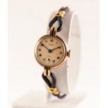 LADY'S LIMIT 9ct GOLD WRISTWATCH with mechanical movement. silvered circular arabic dial with