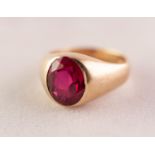 SIGNET RING, the top set with an oval red stone, 5gms, ring size I/J (marked 10k)