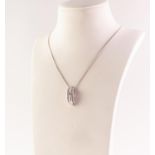 A 9ct gold diamond pendant. Of asymmetric design, the brilliant and baguette cut diamond lines in