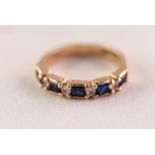 9ct GOLD HALF-HOOP RING set with alternate baguette cut blue stones and tiny white stones, 2.3gms
