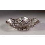 MODERN PIERCED SILVER BON BON DISH, of shallow, hexagonal form with cut card scroll decoration, 5 ¼?