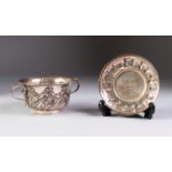 EDWARD VII SILVER PORRINGER AND STAND OF HEAVY GAUGE of part wrythen fluted form, with scroll