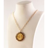 GEORGE V 1915 GOLD SOVEREIGN with 9ct GOLD LOOSE FRAME as a pendant and the 9ct GOLD CHAIN NECKLACE,