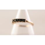 9ct GOLD RING WITH A ROW OF FIVE UNIFORM SMALL INDICOLITE/TOURMALINE, q.6gms, ring size N