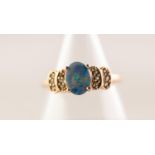 9ct GOLD RING SET WITH A CENTRE OVAL OPAL over two tier stepped shoulders set with 12 TINY
