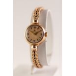 LADY'S OMEGA SWISS 9ct GOLD BRACELET WATCH with 17 jewels movement, small circular dial, INTEGRAL