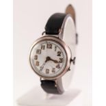 SILVER MILITARY STYLE AUTOMATIC WRISTWATCH The circular white enamel dial with Arabic hour