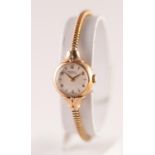 A MID 20TH CENTURY LADIES 9CT GOLD CASED ROTARY MAXIMUS WRISTWATCH 21 jewel movement, numbered