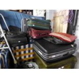 A SELECTION OF SUITCASES, VARIOUS SIZES