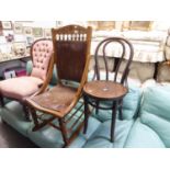 AN EDWARDIAN WALNUT ROCKING CHAIR WITH SOLID BACK AND SEAT AND A BENTWOOD CHAIR (2)