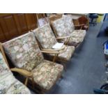 A LATE 1950's/ EARLY 1960's LIGHT WOOD ERCOL LOUNGE SUITE OF TWO SEATER SETTEE AND TWO ARMCHAIRS