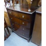 A MID TWENTIETH CENTURY MAHOGANY BOW FRONTED CHEST OF FOUR GRAUDATED DRAWERS
