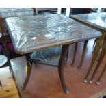 A MID TWENTIETH CENTURY DARK WOOD CORNER TABLE, WITH FLORAL CARVED SQUARE TOP ON FOUR OUTSWEPT