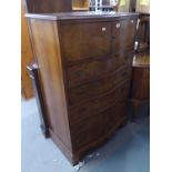 GEORGIAN STYLE FIGURED WALNUT SERPENTINE FRONTED MILLINERY CABINET, WITH SMALL CUPBOARD OVER FIVE