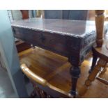 A CARVED OAK LOW TABLE, WITH TWO DRAWERS