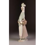 MODERN LLADRO PORCELAIN FIGURE OF A LADY CARRYING A BASKET OF APPLES, 14" (35.5cm) high