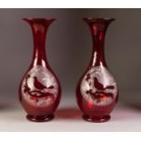 PAIR OF RUBY FLASHED PEAR SHAPED VASES with trumpet necks. the bodies with frosted panels