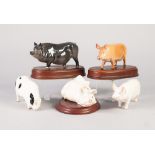 FIVE BESWICK POTTERY MODELS OF PIGS, comprising: two fixed to wooden stands, VIETNAMESE POT BELLY