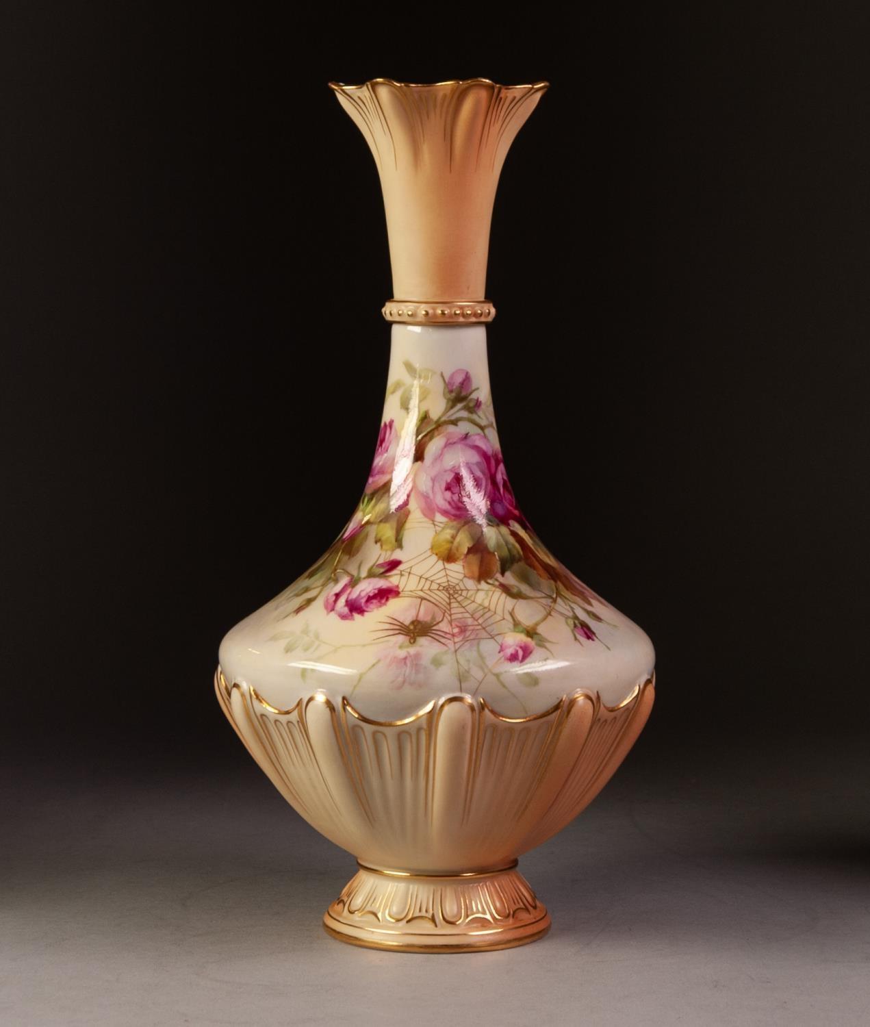 EARLY TWENTIETH CENTURY ROYAL WORCESTER BLUSH CHINA FOOTED VASE, SIGNED ROBERTS, of compressed