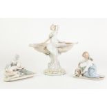 MODERN ROYAL DUX PORCELAIN FIGURAL TABLE CENTRE, GLAZED IN MUTED TONES AND GILT, and modelled as two