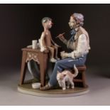 LLADRO ?THE PUPPET PAINTER? PORCELAIN GROUP, modelled as a man with paint brush and paint sat in