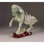 MODERN CHINESE GREEN HARDSTONE MODEL OF A HORSE, on wooden stand