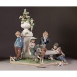 IMPRESSIVE LLADRO ?PUPPY DOG TAILS? PORCELAIN GROUP, modelled with four young boys and four dogs