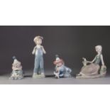 FOUR LLADRO PORCELAIN FIGURES, comprising: LADY SEATED WITH BIRD, 7? (17.8cm) long, BOY WITH PIANO