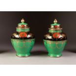 PAIR OF NORITAKE PORCELAIN VASES AND COVERS, each of footed ovoid with gilt finial to the domed