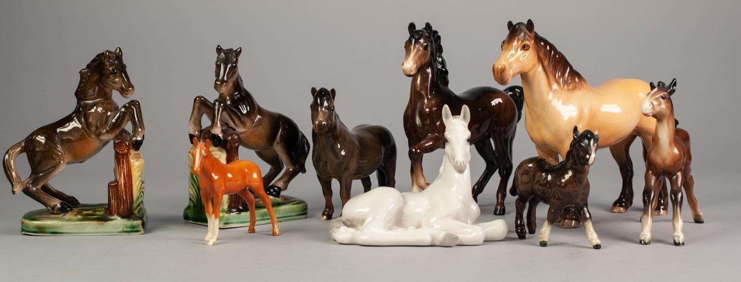 NINE VARIOUS BESWICK AND OTHER CERAMIC HORSES, including a pair of bookends (9)