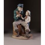 LLADRO ?A TALL YARN? PORCELAIN GROUP, modelled as a young boy standing beside a seated fisherman