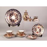 TEN ITEMS OF ROYAL CROWN DERBY and SIMILAR JAPAN DECORATED PORCELAIN, including a miniature helmet