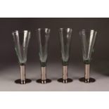 TWO SETS EACH OF SIX WINE AND CHAMPAGNE GLASSES, the green tinted bowls on platinum lustre stems and