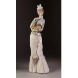 MODERN LLADRO PORCELAIN FIGURE OF A LADY HOLD HER PET DOG, 14 3/4" (37.5cm) high