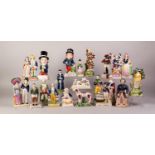 TWENTY TWO REPRODUCTION STAFFORDSHIRE POTTERY FIGURES AND GROUPS, various subjects including
