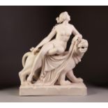 NINETEENTH CENTURY WHITE PARIAN GROUP, modelled as a naked female figure reclining on the back of