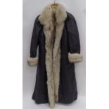 LADIES FULL LENGTH BLACK LEATHER AND FOX FUR TRIMMED AND LINED COAT AND SUNDRY ITEMS OF CLOTHING